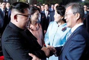 South Korean President Moon Jae-in, North Korean leader Kim Jong Un, Kim's wife Ri Sol Ju and Moon's