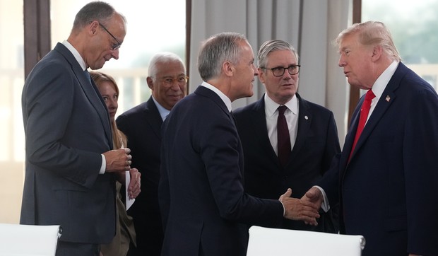 Nemački kancelar Fridrih Merc, italijanska premijerka Đorđa Meloni, predsednik Evropskog saveta Antonio Kosta, kanadski premijer Mark Karni, britanski premijer Kir Starmer i predsednik SAD Donald Tramp tokom radne sesije na samitu G7
