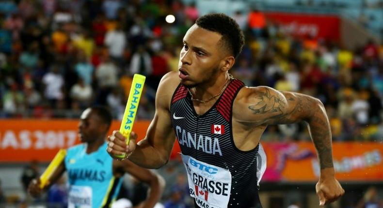 Andre De Grasse's runs a startling third leg in the 4x200m relay to give Canada gold, the first time a country other than the US or Jamaica had won a sprint relay