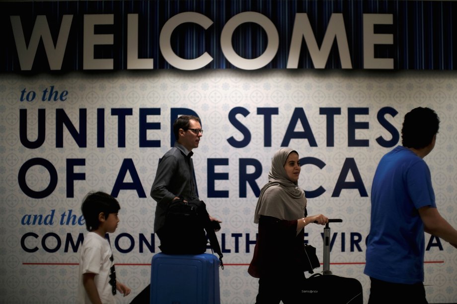 International passengers arrive at Washington Dulles International Airport after the U.S. Supreme Court granted parts of the Trump administration's emergency request to put its travel ban into effect later in the week pending further judicial review, in Dulles, Virginia, U.S., June 26, 2017.