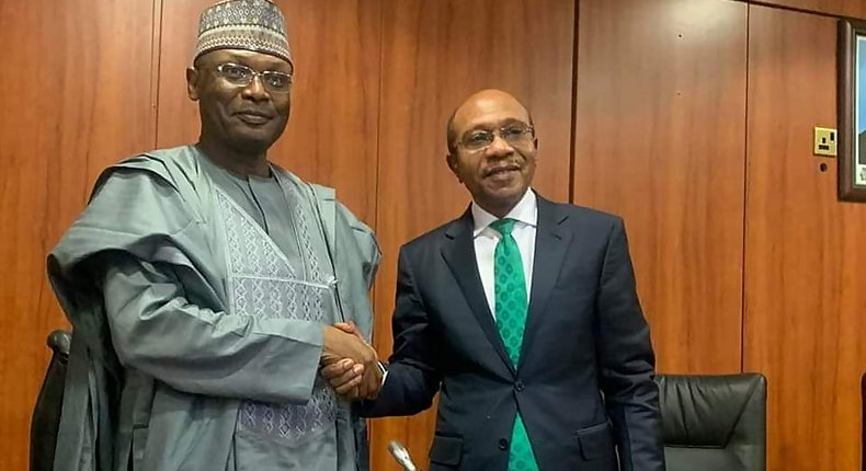 Chairman of the Independent National Electoral Commission, Mahmood Yakubu and Godwin Emefiele, the Governor of the Central Bank of Nigeria. (Leadership)