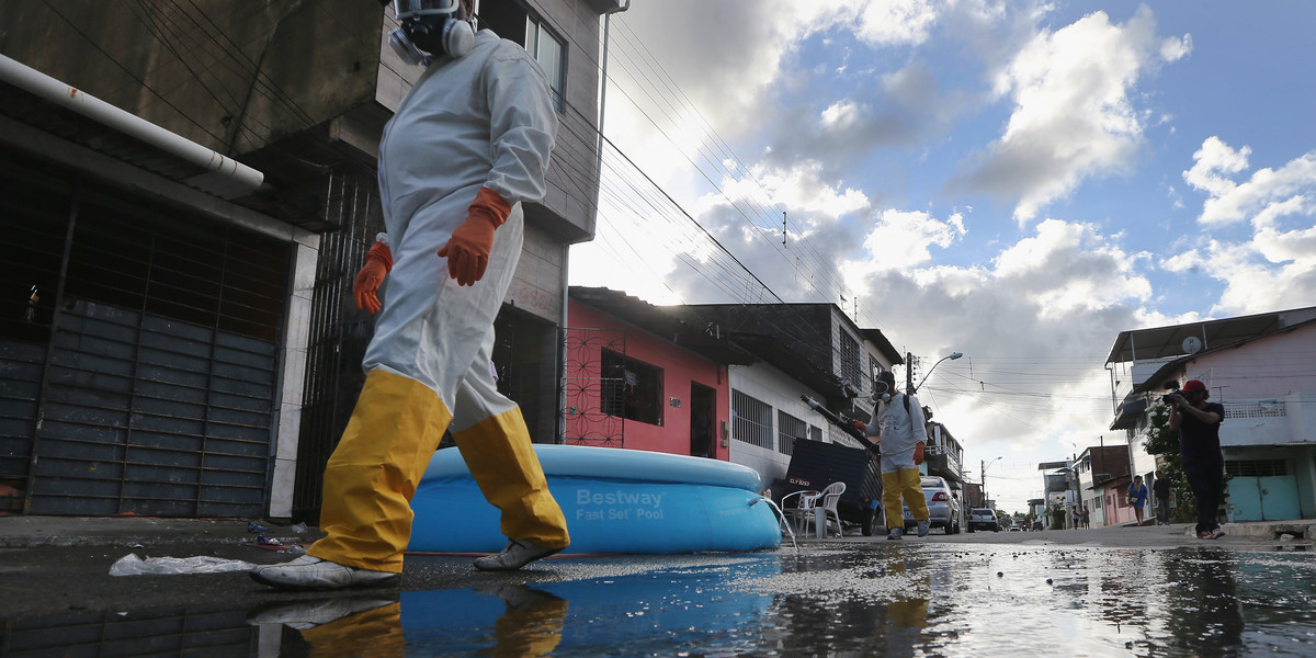 Health workers in Recife, Pernambuco, Brazil, fumigate in an attempt to eradicate the mosquito that transmits the Zika virus.