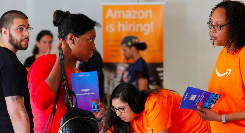 Potential job applicants register for Amazon Jobs Day in Fall River, Massachusetts.