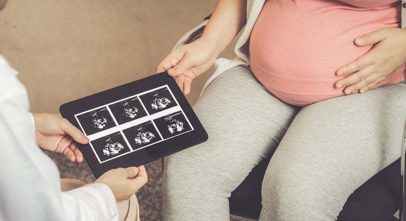 A pregnant woman at a pregnancy consultation.Blue Planet Studio/Getty Images