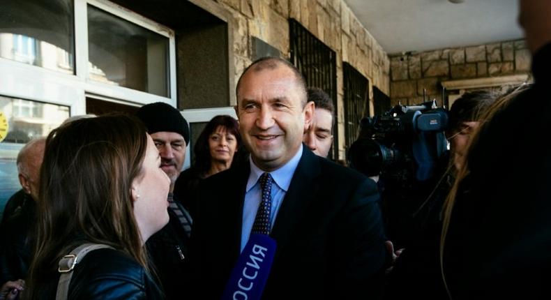 Former head of the Bulgarian airforce Rumen Radev, candidate of the opposition Socialists, talks to the media after voting in Sofia on November 13, 2016