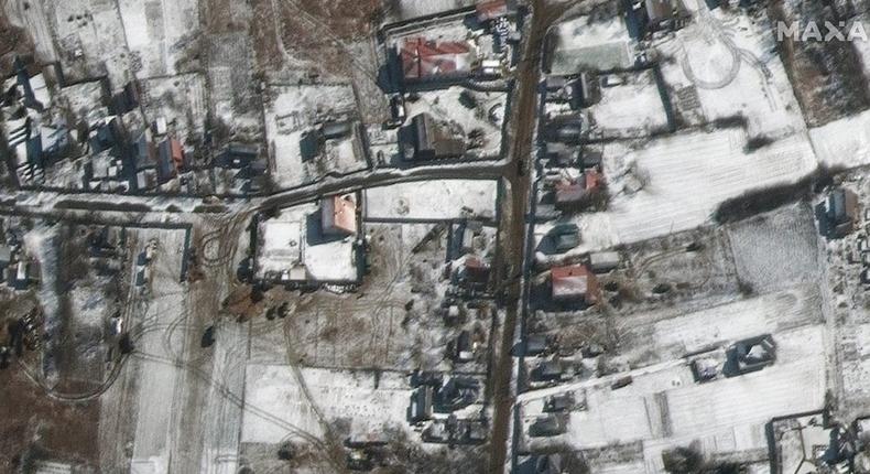 Troops and military vehicles deployed in Ozera, northeast of Antonov Airport.