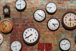 Hand with an old clock. Retro pocket watch