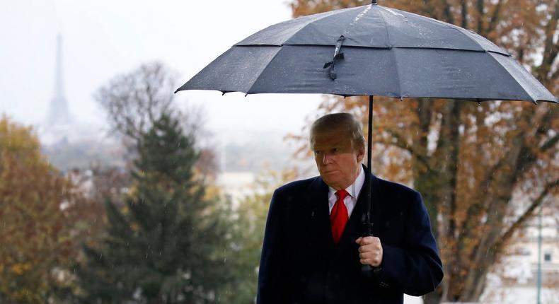 President Donald Trump stands amongst the headstones during an American Commemoration Ceremony, Sunday Nov. 11, 2018, at Suresnes American Cemetery near Paris. Trump is attending centennial commemorations in Paris this weekend to mark the Armistice that ended World War I. November 11, 2018.