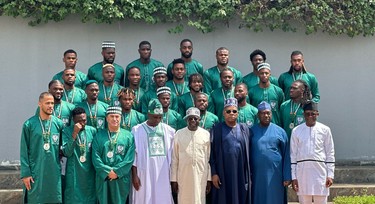 Tinubu honours Super Eagles with MON titles, land gifts