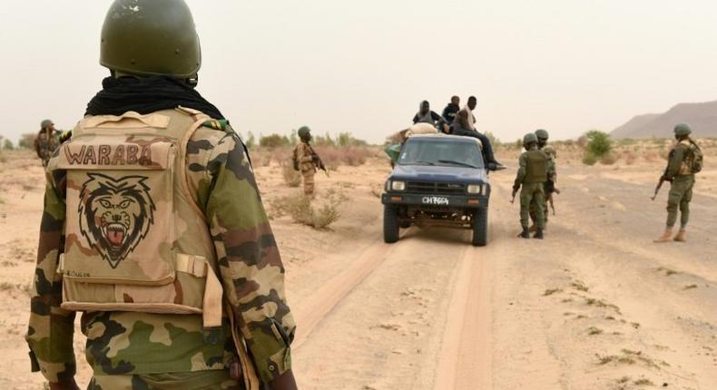 Malian army forces patrol east of Timbuktu in 2015