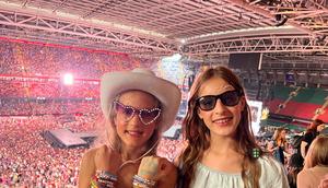 The author's daughters declared the Taylor Swift concert the best day of their lives.Courtesy of Nick Sonderup