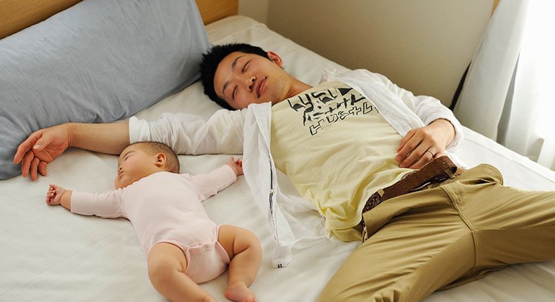 Father and child sleeping