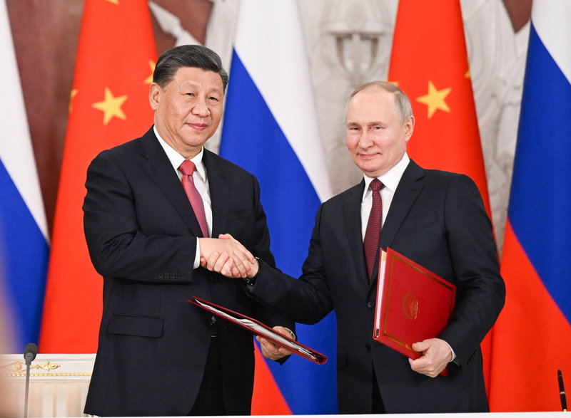 Przewodniczący Chińskiej Republiki Ludowej Xi Jinping i prezydent Rosji Władimir Putin