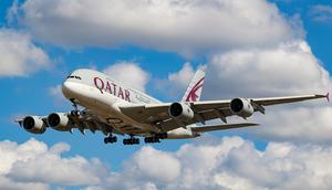 A Qatar Airlines flight prepares to land in London.Nicolas Economou/NurPhoto via Getty Images