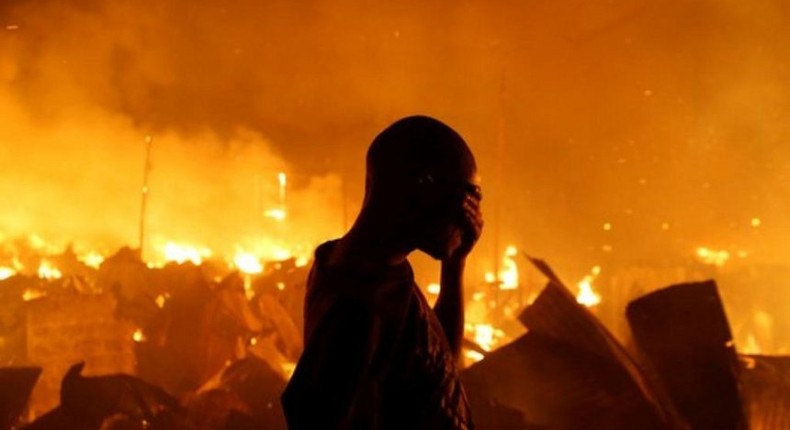 File image of a fire in one of Kenya's Nairobi slums. 3 family members dead, 2 in critical condition after house caught fire in Kariobangi, Nairobi County