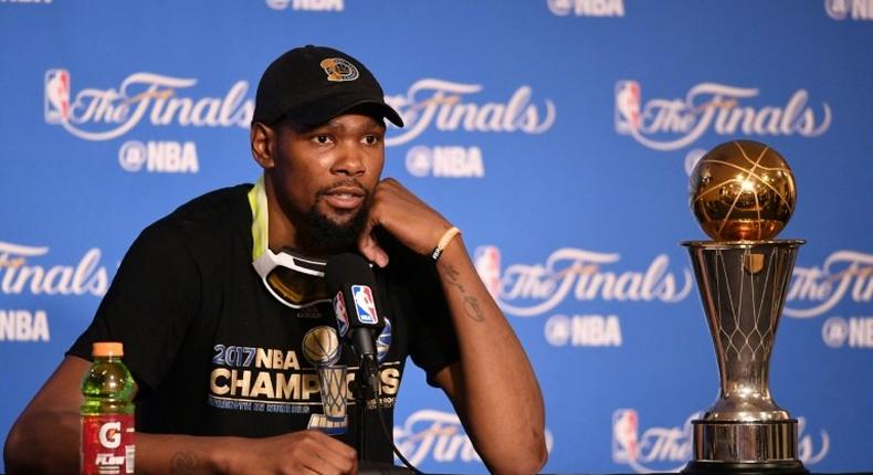 Kevin Durant of the Golden State Warriors speaks at the press conference after his teams 129-120 victory over the Cleveland Cavaliers in Game 5 to win the 2017 NBA Finals at ORACLE Arena on June 12, 2017 in Oakland, California