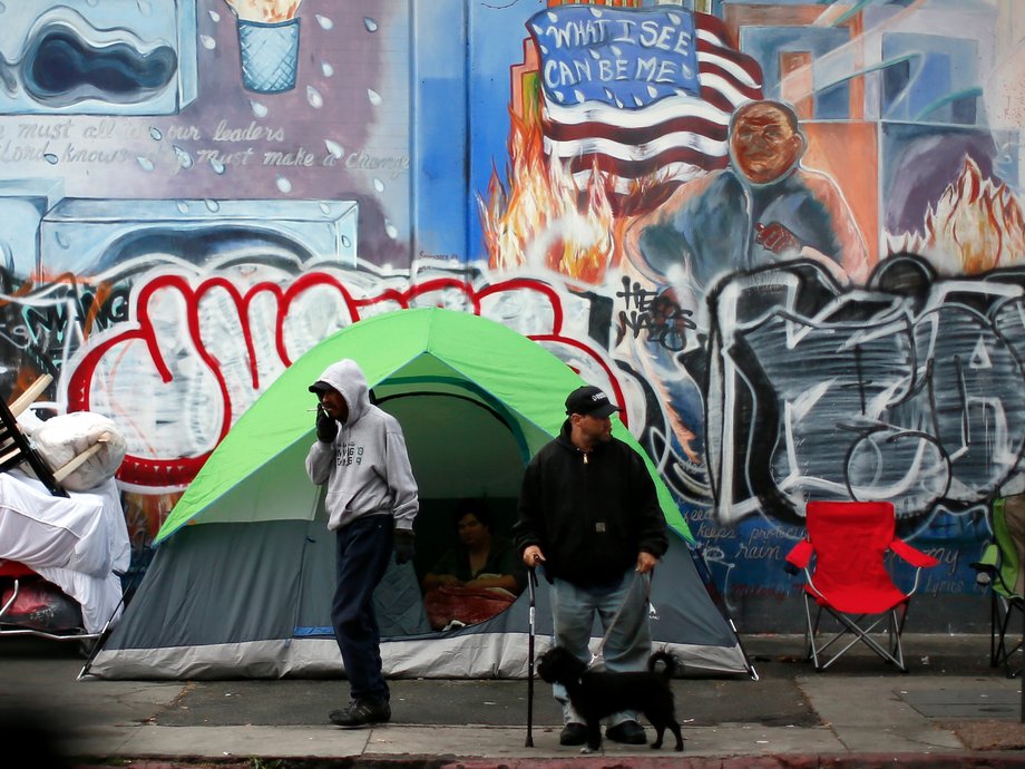 People wake up on downtown Los Angeles' Skid Row.