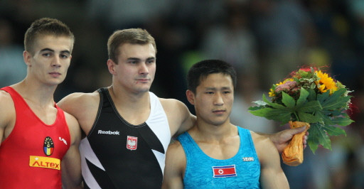 GYMNASTICS-WORLD-GERMANY-PODIUM