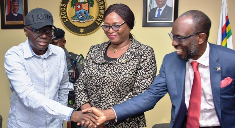 L-R: Lagos State Governor, Mr Babajide Sanwo-Olu; Solicitor General & Permanent Secretary, Lagos State Ministry of Justice, Ms. Titilayo Shitta-Bey and Vice-Chancellor, Lagos State University (LASU), Mr Olanrewaju Fagbohun during the signing of a Build, Operate and Transfer (BOT) agreement with private property developers to deliver 8,272 hostel units on LASU campus at Lagos House, Marina. (NAN)