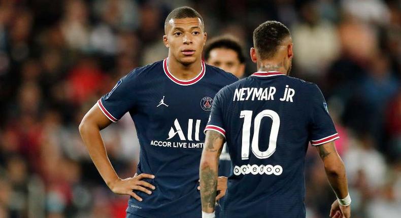 Kylian Mbappe and Neymar playing for PSG