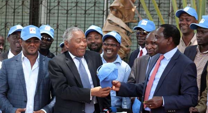 Wiper leader Kalonzo Musyoka (right) received Kwale gubernatorial Aspirant Chirau Ali Mwakwere at the party’s headquarters in Lavington, Nairobi, on March 2, 2017.