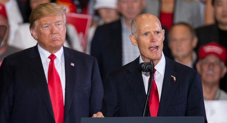 President Donald Trump and Gov. Rick Scott of Florida.