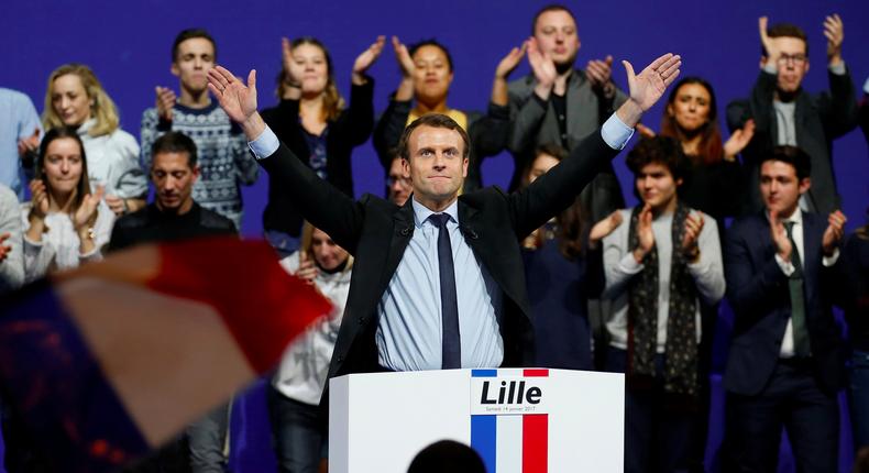 Emmanuel Macron, head of the political movement En Marche !, or Forward !, and candidate for the 2017 French presidential election, sings the French national anthem at the end of a political rally in Lille, France January 14, 2017.