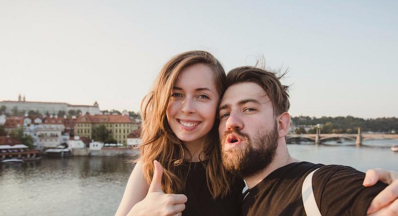 Thumbs up tourists