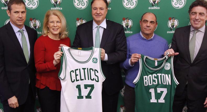 Boston Celtics unveil new jerseys with GE advertising patches.