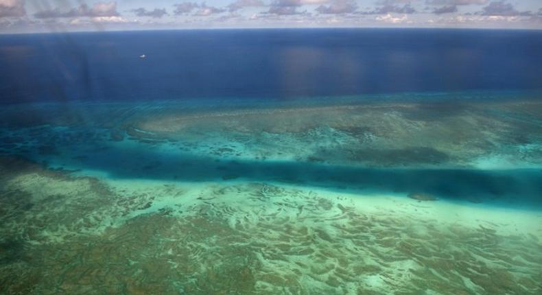 This picture taken in April 2017 shows an aerial view of a reef in the disputed Spratly islands. China claims nearly all of the South China Sea despite partial counter-claims from Taiwan, the Philippines, Brunei, Malaysia and Vietnam