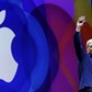 Apple CEO Tim Cook waves as he arrives on stage to deliver his keynote address at the Worldwide Developers Conference in San Francisco