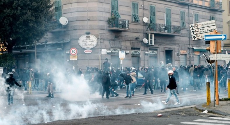 A group of people clash with police during a rally organized by citizens and social community against the political meeting of Matteo Salvini, general secretary of Italian far-right party Lega Nord on March 11, 2017 in Naples