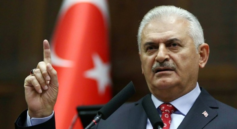 Turkish Prime Minister Binali Yildirim addresses a national assembly of the ruling Justice and Development Party (AK) in Ankara, on November 1, 2016