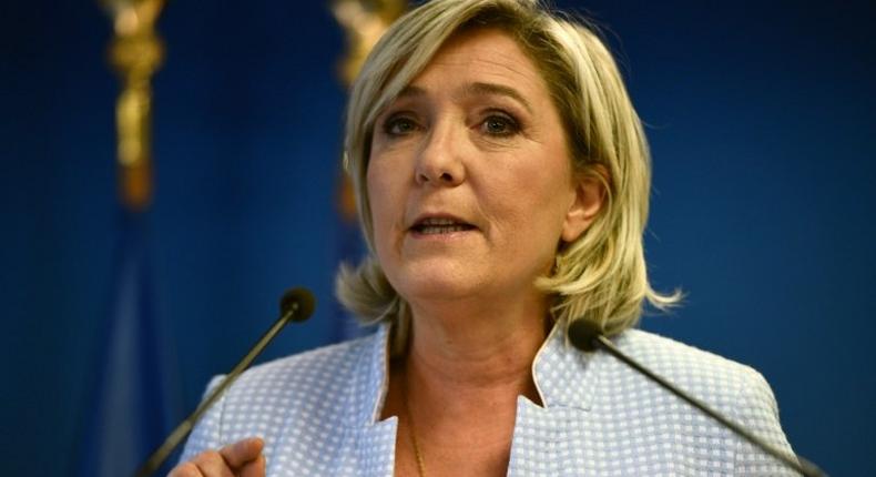 President of the French far-right party and presidential candidate for the 2017 French Presidential elections Marine Le Pen delivers a speech during a press conference on november 9, 2016 in the party headquarters inNanterre, near Paris, following the victory by US Republican candidate Donald Trump in US presidential elections.Marine Le Pen said on November 9, 2016 that Donald Trump's election to the US presidency was good news for France in a speech. Donald Trump has stunned America and the world, riding a wave of populist resentment to defeat Hillary Clinton in the race to become the 45th president of the United States. The Republican mogul defeated his Democratic rival, plunging global markets into turmoil and casting the long-standing global political order, which hinges on Washington's leadership, into doubt.