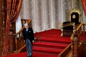 Japan's Emperor Akihito leaves from his seat after he declared the opening of an ordinary session of