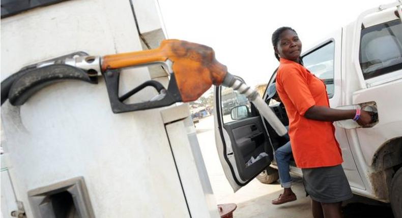 A petrol attendant in Nigeria