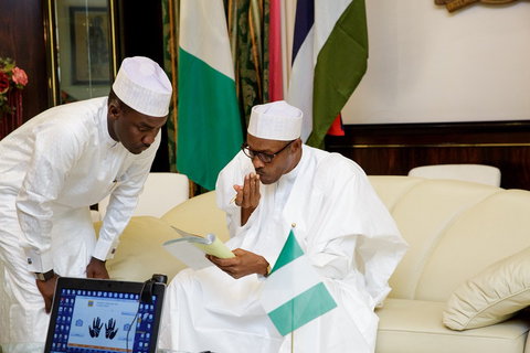 Yusuf Sabiu (Tunde) and President Muhammadu Buhari (Naijaloaded)