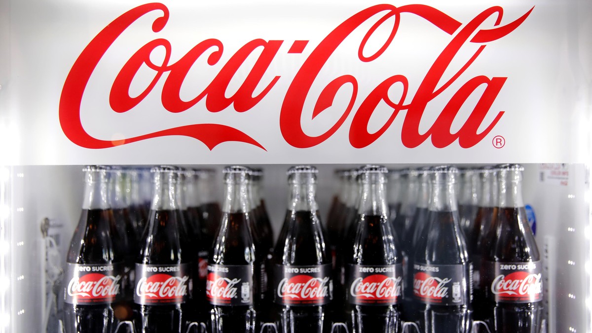 Bottles of Coca-Cola are pictured in a cooler during a news conference in Paris