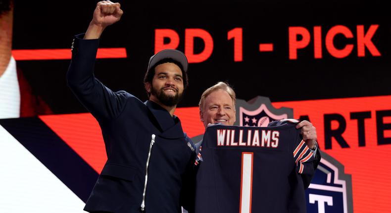 First overall pick Caleb Williams poses with NFL Commissioner Roger Goodell at the 2024 NFL Draft.Gregory Shamus/Staff/Getty Images