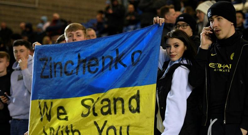 Fans showed support to Ukrainian international Oleksandr Zinchenko, who captained Manchester City against Peterborough Creator: Oli SCARFF