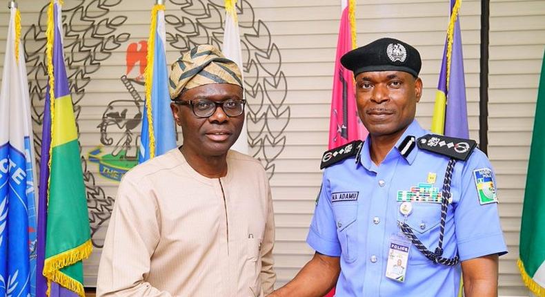 Lagos state Governor Babajide Sanwo-Olu (Left) and the Inspector General of Police, Muhammed Adamu. [Twitter/@jidesanwoolu]