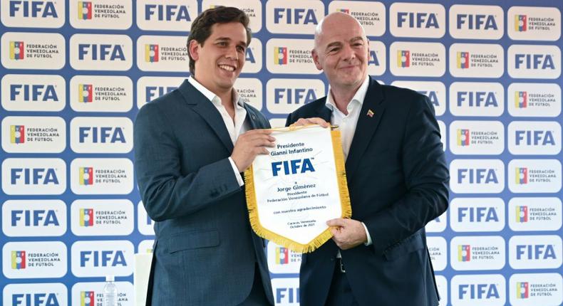 FIFA president Gianni Infantino (right) met the president of the Venezuelan Football Federation Jorge Gimenez during a visit to Caracas Creator: Patrick FORT