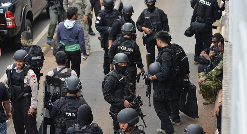 Indonesian Special Police Unit Densus 88 (Special Detachment 88) securing a bomb site in January 2016.