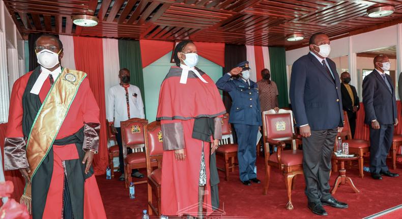 President Uhuru Kenyatta with Chief Justice Martha Koome during swearing in of 34 judges