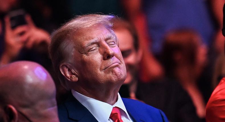 Former US President Donald Trump smiles while attending the Ultimate Fighting Championship 287 mixed martial arts event at the Kaseya Center in Miami, Florida, on April 8, 2023.Chandan Khanna/AFP via Getty Images