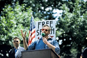 Mike Cernovich speaks during a rally about free speech outside of the White House in Washington