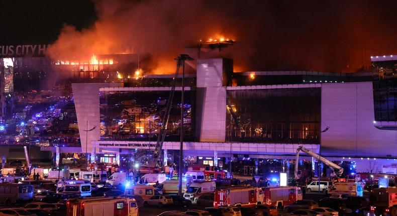 A giant blaze is seen over Crocus City Hall in Moscow after several gunmen burst into a concert hall and fired at the crowd on Friday, March 22, 2024 [Courtesy]