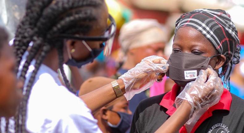 Victoria Michaels donates nose masks to market women