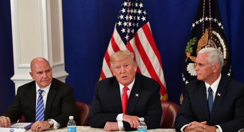 US National Security Advisor H.R. McMaster, President Donald Trump and Vice President Mike Pence (L to R) were among those attending Friday's talks at Camp David