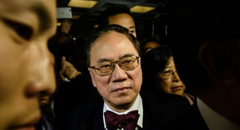 Former Hong Kong chief executive Donald Tsang leaves the Hong Kong High Court after the jury found him guilty of misconduct in his high-profile corruption trial on February 17, 2017